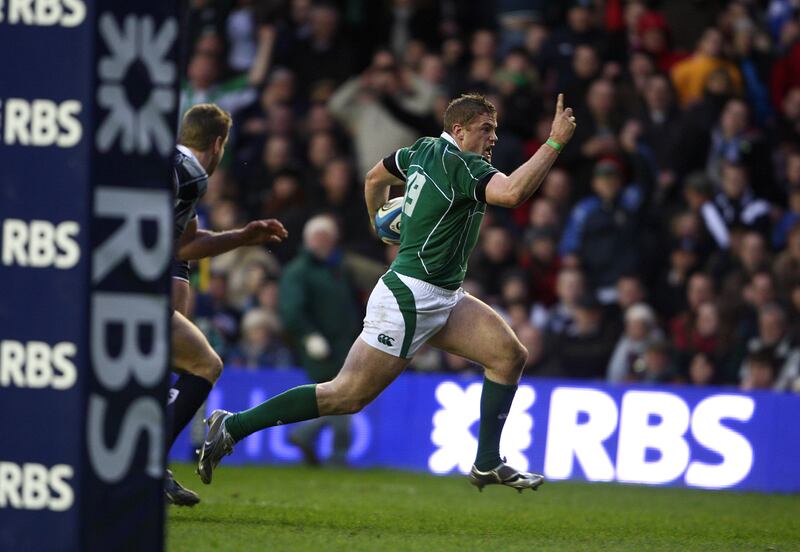 Ireland's Jamie Heaslip celebrates his try as he runs in at Murrayfield. Photograph: Billy Stickland/Inpho