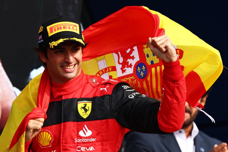 Carlos Sainz celebrates his first Grand Prix win at Silverstone. Photograph: Clive Rose/Getty Images