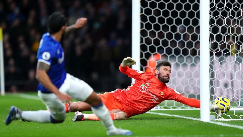 Theo Walcott scores Everton’s third goal. Photo: Catherine Ivill/Getty Images