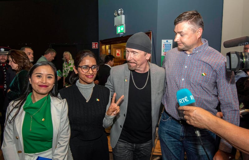 The Edge, real name David Howell Evans, pictured with fellow citizens after they received Irish Citizenship at the Gleneagle Killarney on Monday. Photograph: Don MacMonagle