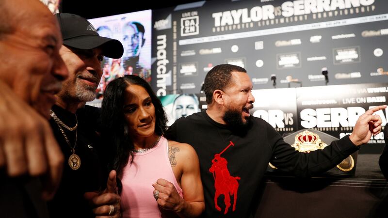 Amanda Serrano of Puerto Rico  poses for a photo with trainer Jordan Maldonado. Photograph:  Sarah Stier/Getty
