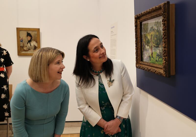 Arts Minister Catherine Martin TD (right) and Dr Caroline Campbell, Director of the National Gallery of Ireland, at the unveiling of the first painting acquired by NGI, by renowned French artist, Paul Cézanne.  Photo: Nick Bradshaw/The Irish Times