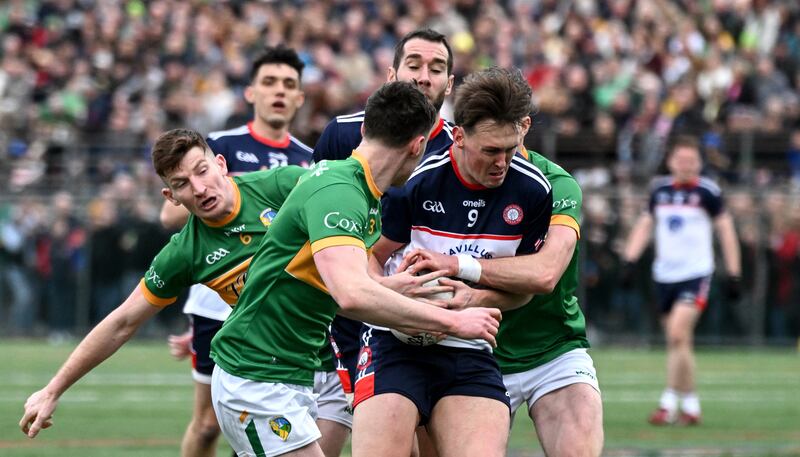 Leitrim’s Shane Quinn and Mark Diffley with Gavin O’Brien of New York. Photograph: Emily Harney/Inpho