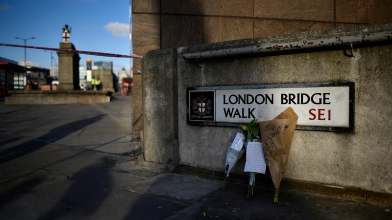 Flowers rest against a wall at the scene of Friday’s London Bridge stabbing. Photograph: Peter Summers/Getty