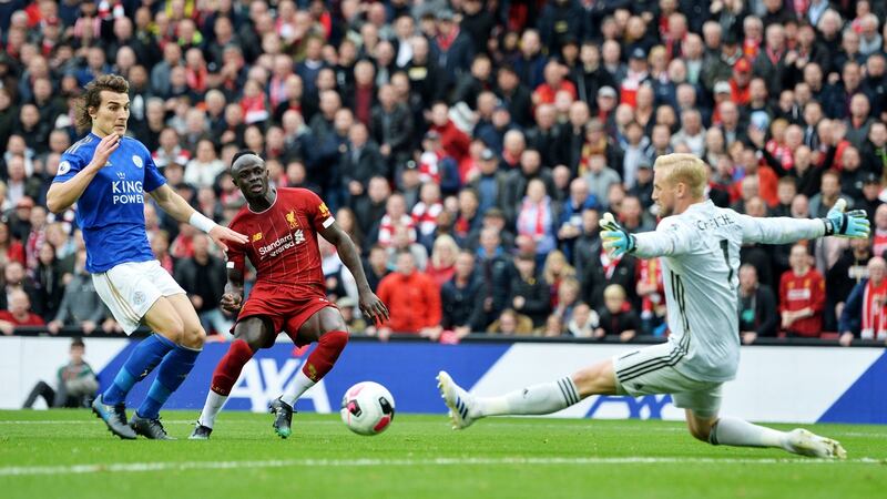 Sadio Mane Liverpool past Leicester goalkeeper Kasper Schmeichel in the first half at Anfield. Photograph: EPA