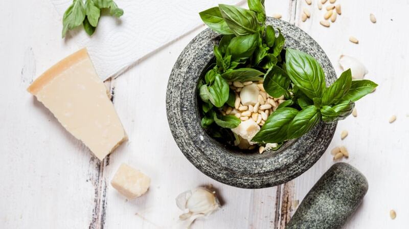 Preparing pesto alla genovese with a mortar. Photograph: Getty Images