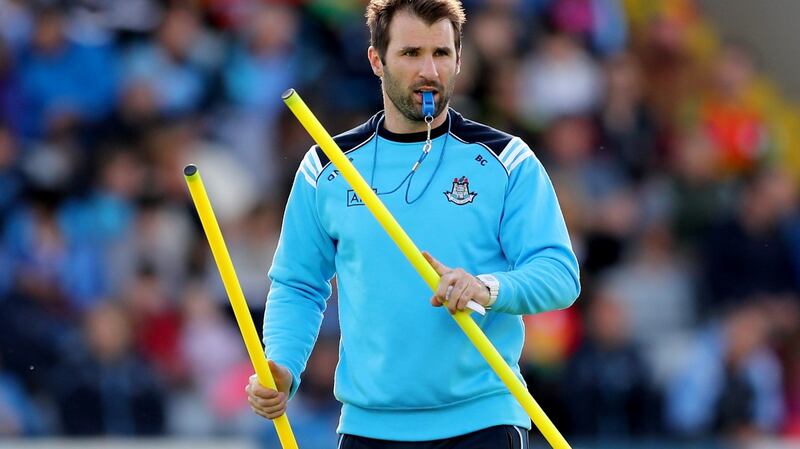 Dublin coach Bryan Cullen prepares the team warm-up. Photograph: James Crombie/Inpho