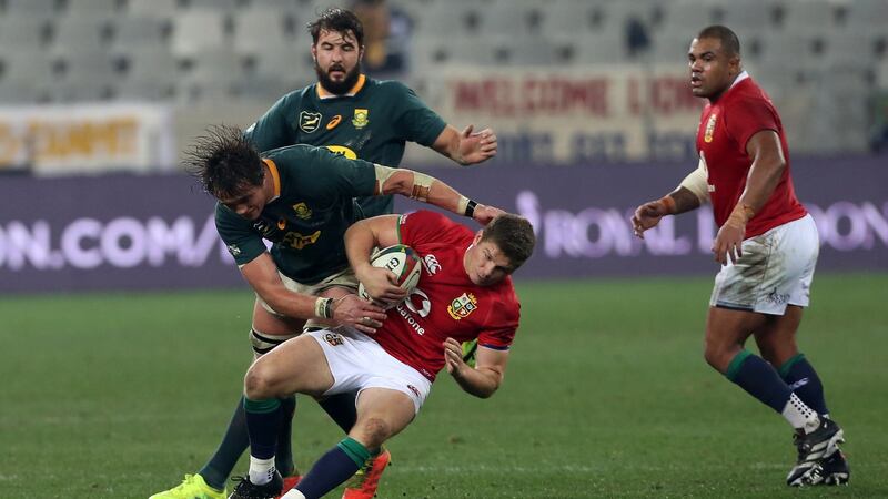 Owen Farrell of the British & Irish Lions is tackled by Franco Mostert of South Africa during the second Test between the Springboks and the Lions at Cape Town on Saturday July 31st. Photograph: EJ Langner/Gallo Images/Getty Images