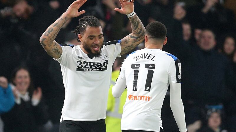 Derby County’s Colin Kazim-Richards celebrates with Ravel Morrison after scoring at Pride Park Stadium. Photograph: Nigel French/PA