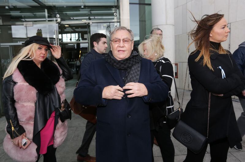 Family of the late David Byrne, including his father James Byrne, leave the Special Criminal Court after the State dropped the charges against Patrick Hutch in the Regency shooting trial. Photograph: Laura Hutton