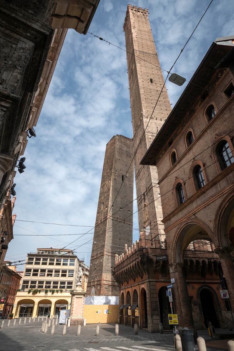 The Garisenda and Asinelli towers, known as the Two Towers, in Bologna, Italy. Photograph: Massimo Paolone/Lapresse/AP