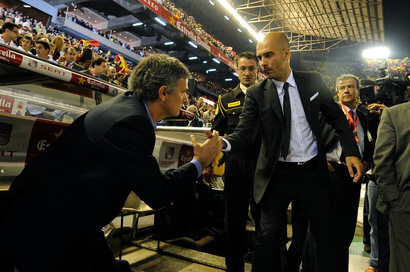 José Mourinho greets then Barcelona manager Pep Guardiola before Real Madrid's victory in the intense 2011 Spanish Cup final. Photograph: Jose Jordan/AFP via Getty Images