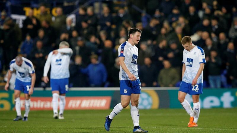 Tranmere Rovers’ Connor Jennings and team mates look dejected. Photo: Andrew Yates/Reuters