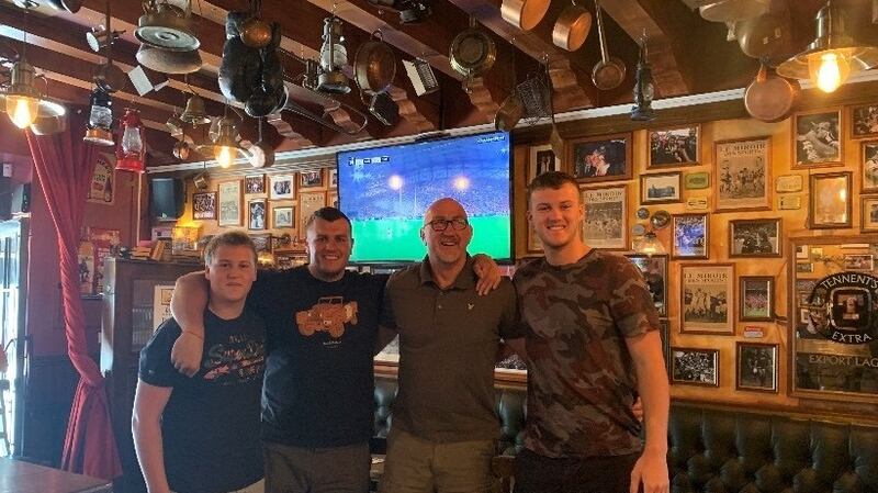 Bobby, Daniel, Trevor and Joshua Brennan in the family-owned Brennan’s Bar in Castelginest.