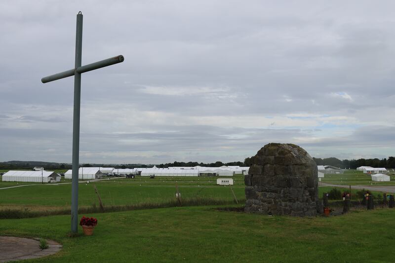 The cross and Marian shrine which overlooks the site in Screggan.