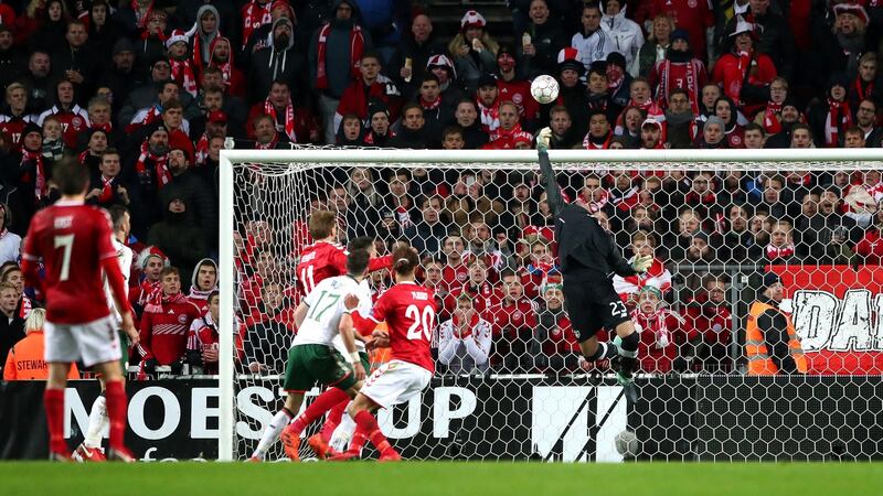 Ireland’s Darren Randolph knocks Yussuf Poulsen’s close-range header over the bar in the dying minutes of Saturday’s World Cup first-leg play-off against Denmark in Copenhagen.  Photograph: James Crombie/Inpho
