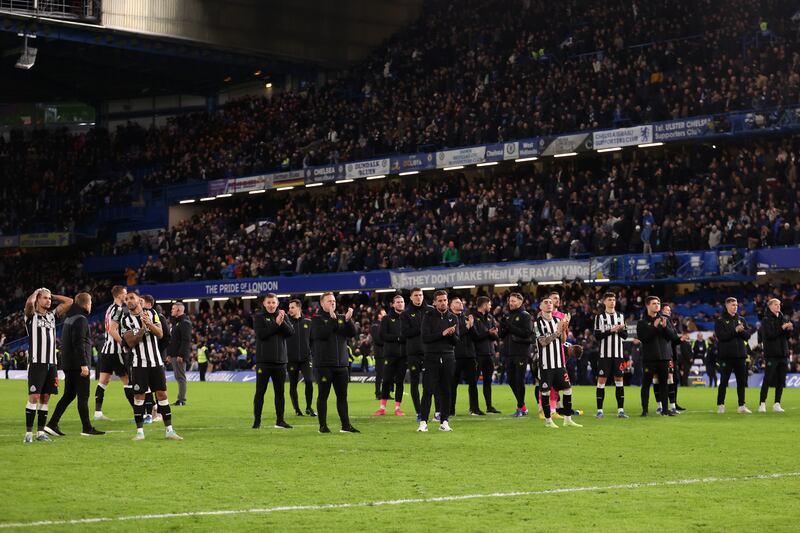 LONDON, ENGLAND - DECEMBER 19: Players of Newcastle United applauds fans following their sides defeat after a penalty shoot out in the Carabao Cup Quarter Final match between Chelsea and Newcastle United at Stamford Bridge on December 19, 2023 in London, England. (Photo by Julian Finney/Getty Images)