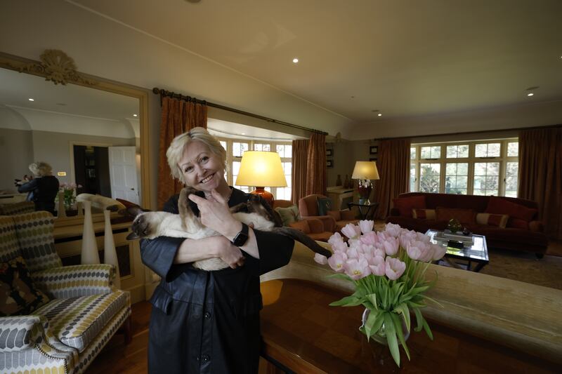 Cathy Kelly and her cat, Juno. Photograph: Nick Bradshaw