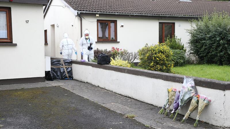 Flowers are left near the location where pensioner Peter McDonald (77) was killed on Saturday. Photograph: Collins