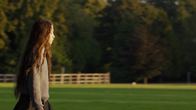 Eliza Somerville, the gifted 12-year-old, a picture of silent misery.  By year end, we see her blossoming, smiling on occasion, sweeping all before her academically