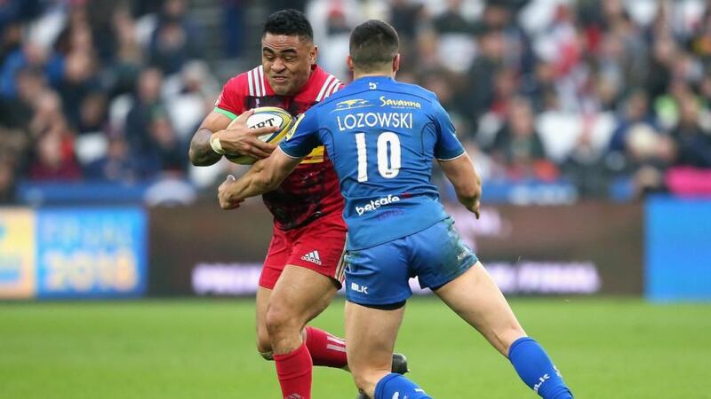 Alex Lozowski tackles Francis Saili during Saracens’ win over Harlequins. Photograph: Alex Pantling/Getty