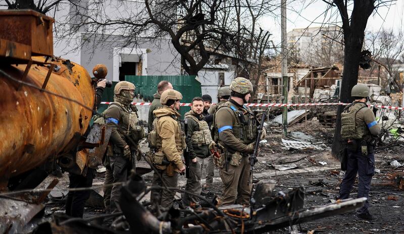 Ukrainian president Volodymyr Zelenskiy observes the devastation wrought on the town of Bucha. Photograph: Ronaldo Schemidt/Getty Images
