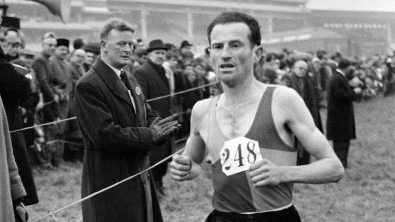 Jim Hogan in action during a cross-country race on Epsom Downs in January 1964. Photograph: Bob Thomas/Getty Images