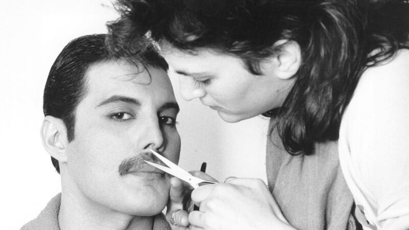 Freddie Mercury gets his moustache groomed in 1982. Photograph: Steve Wood/Express/Getty Images