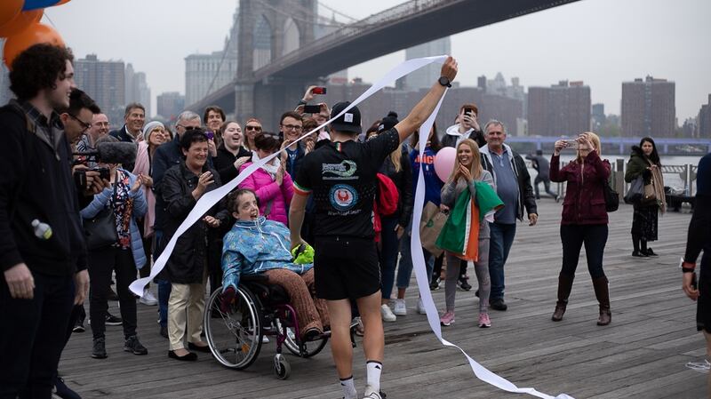 Mary Evans and Shane Finn at the finish-line in New York.