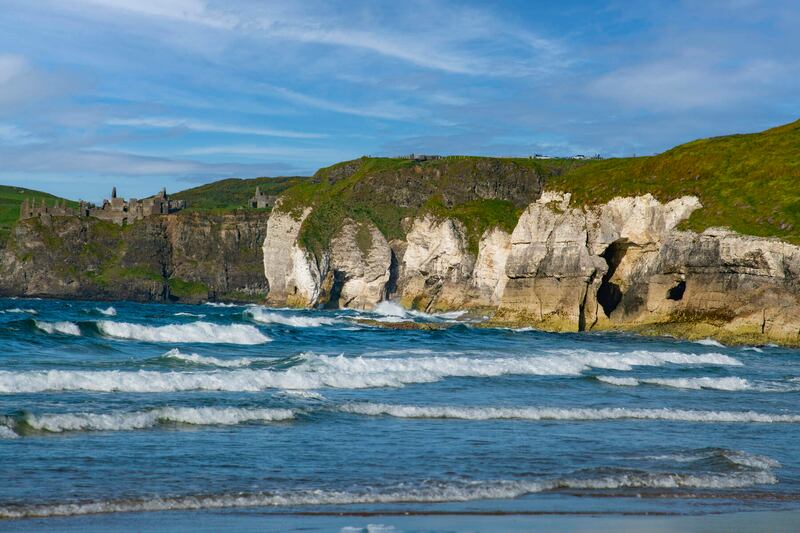 The magnificent ruined Dunluce Castle near the seaside town of Portrush on the County Antrim coast