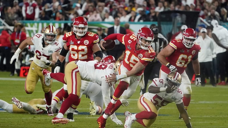 Patrick Mahomes runs the ball during Super Bowl LIV between the Kansas City Chiefs and the San Francisco 49ers. Photograph: Timothy A Clary/Getty/AFP