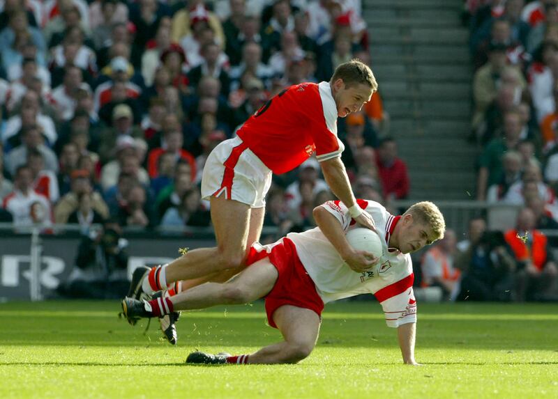 Armagh's Kieran McGeeney with Kevin Hughes of Tyrone during the All-Ireland final of 2003. Photograph: Morgan Treacy/Inpho