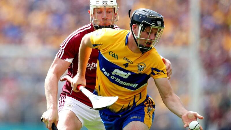Clare’s Jack Browne and Joe Canning of Galway. Photograph: Inpho/Bryan Keane