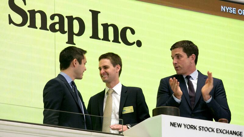 Snapchat co-founders Bobby Murphy, left, and  Evan Spiegel, centre. Photograph: Richard Drew/AP