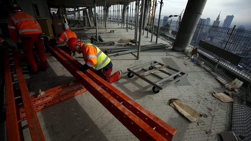 Building work on a skyscraper in Warsaw. Photograph: REUTERS/Kacper Pempel