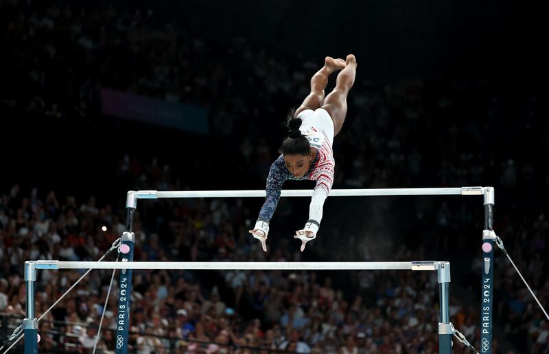 Simone Biles of Team United States competes on the uneven bars. Photograph: Naomi Baker/Getty