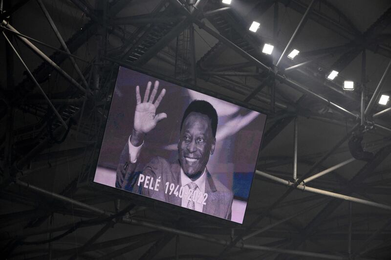 A photograph of Brazilian football legend Pele is displayed on a giant screen prior to the French Ligue 1 match between Marseille and Toulouse FC at the Velodrome stadium. Photograph: Nicolas Tucat/AFP via Getty Images
