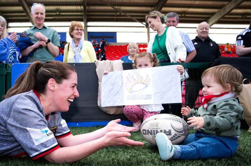 Ballincollig Trailblazers’ Jane Burns plays with her daughter Jessica during IMART. Photograph: Tom Maher/Inpho