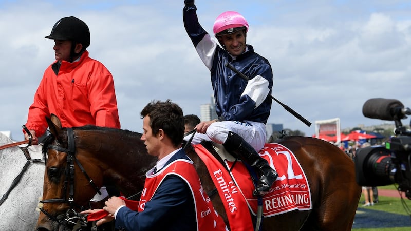 Australian jockey Corey Brown gestures  after riding Rekindling to win the Melbourne Cup at Flemington Racecourse on Tuesday. Photograph: EPA