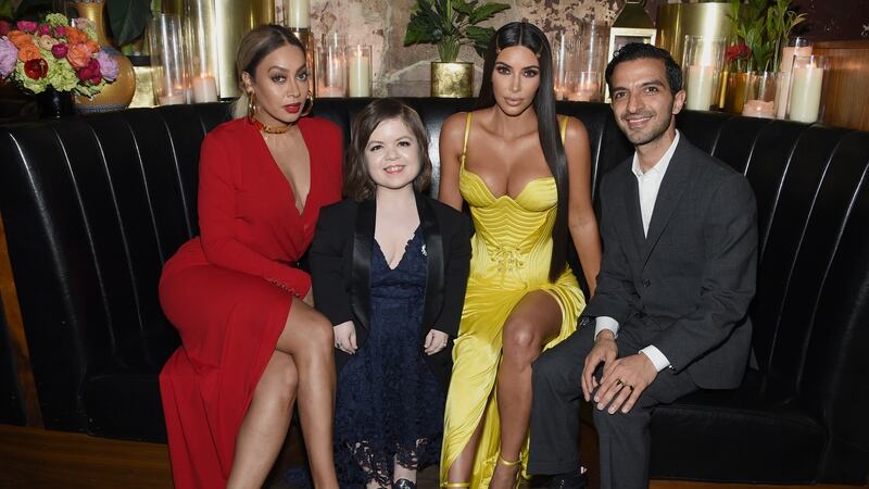 Sinéad Burke with the actor Lala Anthony, Kim Kardashian and the Business of Fashion founder Imran Amed in New York City. Photograph: Dimitrios Kambouris/Getty
