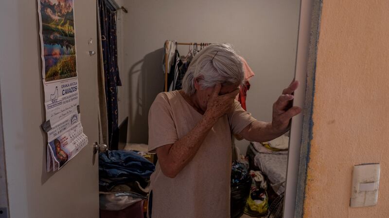 Dorotea Bautista, whose 26-year-old granddaughter Yolanda Martinez has been missing since March 31st, cries while listening to her son talk about his daughter’s disappearance, at their home in Monterrey, Mexico. Photograph: Alejandro Cegarra/New York Times