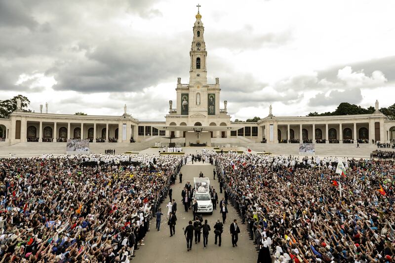 Pope Francis in his popemobile. Photograph: Paulo Novais/Pool Photo via AP