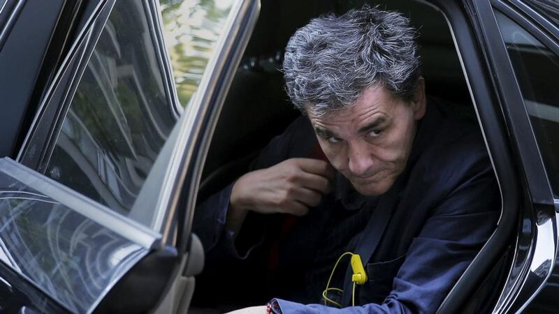 Greek finance minister Euclid Tsakalotos arrives for a ruling Syriza party political committee meeting at the party’s headquarters in Athens, on Tuesday. Photograph: Reuters