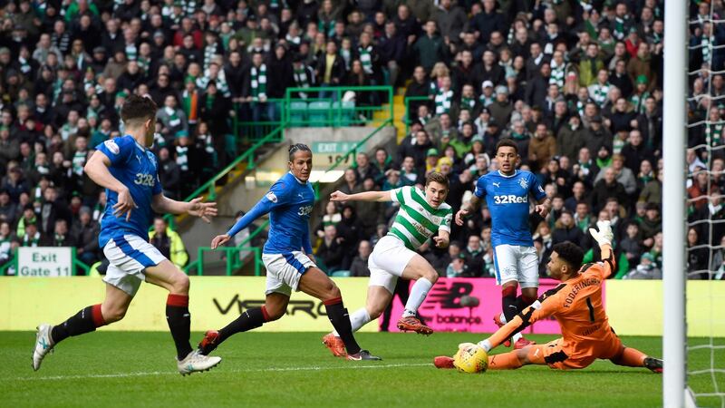 Wes Foderingham dives to save James Forrest’s shot during a goalless Old Firm derby. Photograph: Ian Rutherford/PA