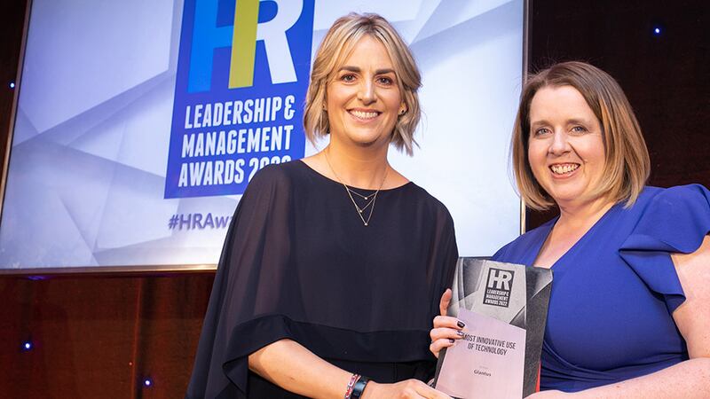 Siobhra Disdale, awards judge, presents the Most Innovative Use of Technology award to Jennifer Dolan, Glantus.