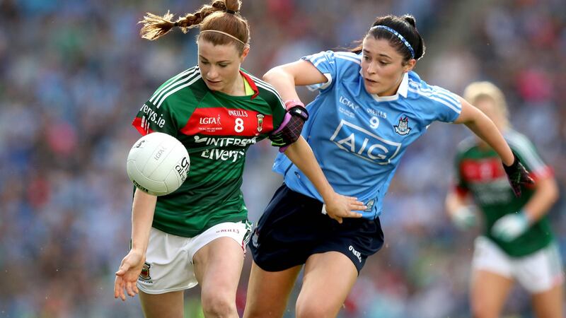 Dublin’s Olwen Carey challenges  Aileen Gilroy of Mayo during the  TG4 Ladies Senior All-Ireland Football Championship Final at Croke Park. Photograph: Ryan Byrne/Inpho