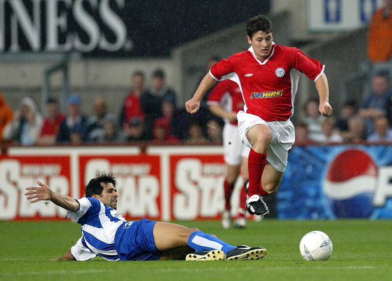 Wes Hoolahan of Shelbourne and Juan Valeron of Deportivo La Coruna. Photograph: Lorraine O'Sullivan/Inpho 