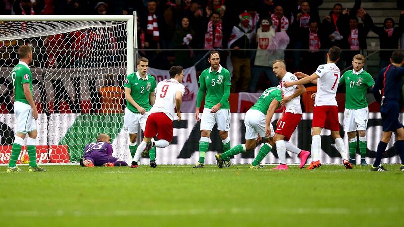 oland’s Robert Lewandowski scores their second goal. Photo: Donall Farmer/Inpho