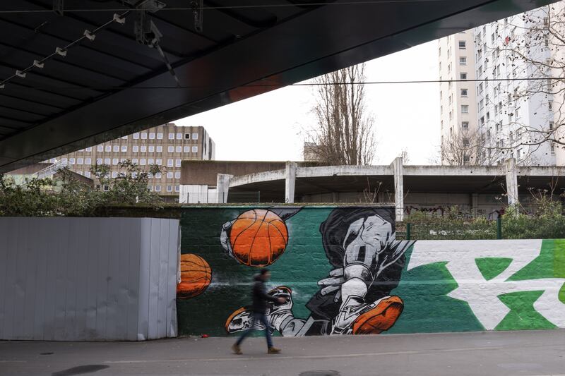 A mural in the Porte de La Chapelle neighborhood. The government hope the Olympics will herald urban regeneration around Paris.  Photographer: Nathan Laine/Bloomberg via Getty Images