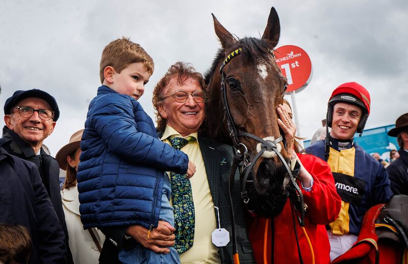 Sean Mulryan with his grandson Sean, JJ Slevin and Fastorslow after success in the Punchestown Gold Cup. Photograph: Ryan Byrne/Inpho 